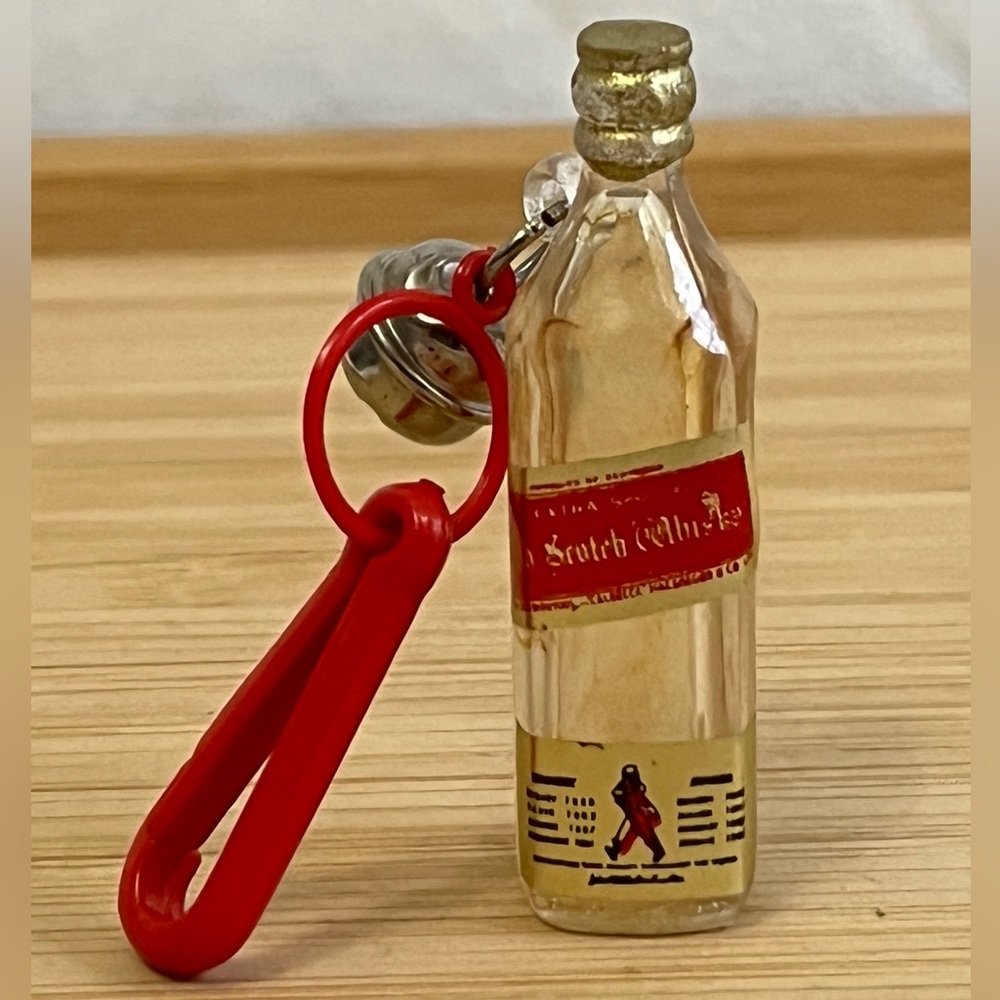 RARE VTG 1980s Johnnie Walker Red Plastic Clip Necklace Charm w/ Bell